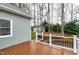 A well-maintained deck leads to a landscaped backyard with a charming shed at 1821 Kelly Glen Dr, Apex, NC 27502