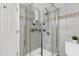 Bathroom with a glass-enclosed shower and tiled walls at 1821 Kelly Glen Dr, Apex, NC 27502