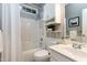 Bathroom featuring a combined shower and tub, accompanied by modern fixtures and a vanity at 1821 Kelly Glen Dr, Apex, NC 27502