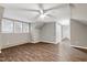 Spacious bedroom with hardwood floors, a ceiling fan and lots of natural light at 1821 Kelly Glen Dr, Apex, NC 27502