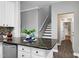 Kitchen island featuring granite countertops and modern finishes at 1821 Kelly Glen Dr, Apex, NC 27502
