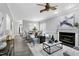 A open living space showcasing a fireplace, stylish decor, and a cohesive color scheme at 1821 Kelly Glen Dr, Apex, NC 27502
