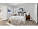 Comfortable main bedroom with cool grey walls, natural light, and contemporary decor at 1821 Kelly Glen Dr, Apex, NC 27502
