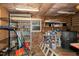 Shed interior showcasing various storage solutions like shelves and containers at 1821 Kelly Glen Dr, Apex, NC 27502