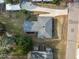 Birds-eye view of home with a well manicured lawn, new roof, and garden at 1917 Bivins St, Durham, NC 27707