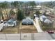 Aerial view of the property with surrounding homes, driveway, and well-maintained yard at 1917 Bivins St, Durham, NC 27707