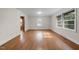 Inviting living room featuring hardwood floors, natural light, and fresh paint at 1917 Bivins St, Durham, NC 27707