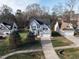 Aerial front view of a home with a two-car garage and manicured front yard at 206 May Farm Rd, Pittsboro, NC 27312