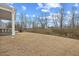 Large backyard with room to entertain and enjoy the outdoors with its serene landscape at 213 Chateau Way, Angier, NC 27501