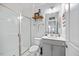 Clean, bright bathroom features a glass shower, modern fixtures, and sleek vanity at 213 Chateau Way, Angier, NC 27501