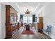 Elegant dining room showcases sophisticated decor and natural light, creating a perfect ambiance for gatherings at 213 Chateau Way, Angier, NC 27501