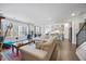 Cozy living room with an open floor plan, comfortable sofa, and inviting atmosphere at 213 Chateau Way, Angier, NC 27501