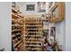 Custom wine cellar with ample storage for wine bottles and accessories at 213 Chateau Way, Angier, NC 27501