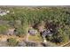 Aerial view of neighborhood homes surrounded by mature trees and partly wooded lots at 2204 Gentry Dr, Durham, NC 27705