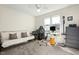 Bedroom with a daybed, desk area, and a ceiling fan at 2204 Gentry Dr, Durham, NC 27705