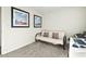 Bedroom with daybed, artwork, and desk area is ideal as an office or guest room at 2204 Gentry Dr, Durham, NC 27705