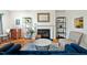 Cozy living room showcasing a fireplace, hardwood floors, and elegant decor at 2204 Gentry Dr, Durham, NC 27705