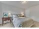 Bright bedroom with neutral décor featuring a comfortable bed, side tables, and soft lighting at 274 Roaring Creek Dr, Garner, NC 27529