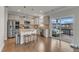 Bright, modern kitchen with stainless steel appliances, granite countertops, and a breakfast bar at 274 Roaring Creek Dr, Garner, NC 27529