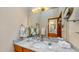 Well-lit bathroom featuring a stylish vanity, mirror, and elegant fixtures, creating a spa-like experience at 3306 Whitfield Rd, Chapel Hill, NC 27514