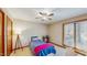 Charming bedroom with a window bringing in natural light and a ceiling fan at 3306 Whitfield Rd, Chapel Hill, NC 27514