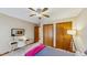 Bright bedroom featuring a comfortable bed, a desk, and plenty of closet space at 3306 Whitfield Rd, Chapel Hill, NC 27514