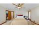 Cozy bedroom featuring a comfortable bed, closet, and an inviting ambiance for restful nights at 3306 Whitfield Rd, Chapel Hill, NC 27514