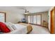 Well-lit bedroom with ample natural light and serene views, ideal for restful nights at 3306 Whitfield Rd, Chapel Hill, NC 27514
