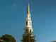 The UNC Chapel Hill Bell Tower featuring a soaring spire against a clear, blue sky at 3306 Whitfield Rd, Chapel Hill, NC 27514