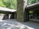 Spacious deck offers ample room for entertaining, complete with a stone fireplace feature at 3306 Whitfield Rd, Chapel Hill, NC 27514