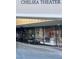Chelsea Theater featuring a modern storefront with glass windows and a clean facade at 3306 Whitfield Rd, Chapel Hill, NC 27514