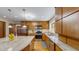 Updated kitchen featuring stainless steel appliances, granite countertops, and ample cabinet space at 3306 Whitfield Rd, Chapel Hill, NC 27514