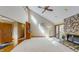 Bright living room with vaulted ceilings, and wood burning fireplace at 3306 Whitfield Rd, Chapel Hill, NC 27514