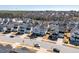 Aerial view of a residential neighborhood featuring tree-lined streets and meticulously designed homes at 3418 Longleaf Estates Dr, Raleigh, NC 27616