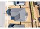 Aerial view showcases the roof and surrounding neighborhood with lawns and neatly lined streets at 3418 Longleaf Estates Dr, Raleigh, NC 27616