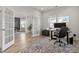Bright office space with natural light, French doors and a view to the dining room at 3418 Longleaf Estates Dr, Raleigh, NC 27616