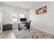 Office space with natural light, neutral walls and an artful rug at 3418 Longleaf Estates Dr, Raleigh, NC 27616