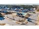 Aerial image of a community pool, clubhouse, playground, and surrounding homes in a residential area at 3418 Longleaf Estates Dr, Raleigh, NC 27616