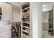 Walk-in closet features custom storage and open shelving at 3418 Longleaf Estates Dr, Raleigh, NC 27616