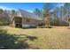 Spacious backyard with a well-maintained lawn at 348 Raymond Tharrington Rd, Louisburg, NC 27549