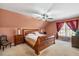 Comfortable bedroom features an ensuite and large windows for natural light at 348 Raymond Tharrington Rd, Louisburg, NC 27549