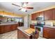 Spacious kitchen featuring granite countertops, stainless steel appliances, and an island at 348 Raymond Tharrington Rd, Louisburg, NC 27549