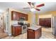 Cozy kitchen with an island, stainless steel appliances, and tile flooring at 348 Raymond Tharrington Rd, Louisburg, NC 27549