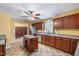 Charming kitchen features granite countertops, an island, and stainless steel appliances at 348 Raymond Tharrington Rd, Louisburg, NC 27549