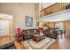 Cozy living room featuring a warm ambiance, comfortable seating and a view into the kitchen at 348 Raymond Tharrington Rd, Louisburg, NC 27549