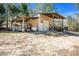 Large metal outbuilding with covered bays and workshop at 348 Raymond Tharrington Rd, Louisburg, NC 27549