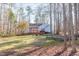 Spacious backyard with patio, outdoor furniture and garden, perfect for entertaining guests at 355 Riverstone Dr, Clayton, NC 27527