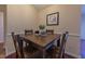 Cozy dining area featuring a wood table and seating for four, perfect for everyday meals at 355 Riverstone Dr, Clayton, NC 27527