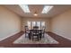 Sun-filled dining area with skylights and a door to the backyard, great for Gathering gatherings at 355 Riverstone Dr, Clayton, NC 27527