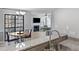 Open concept layout with granite counters, and view into the dining and living areas at 3803 Chimney Ridge Pl # 102, Durham, NC 27713